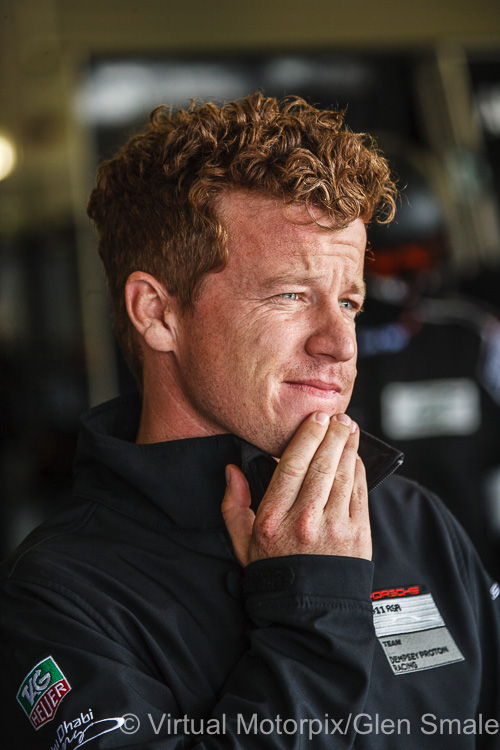 WEC Silverstone 6 Hour, 12 April 2015: Patrick Long in contemplative mood in the pit garage of the #77 Dempsey-Proton Racing Porsche 911 RSR