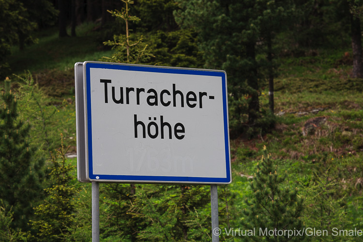 The sign board announces the famous Turracher Höhe pass in Austria where the Audi quattro concept first proved itself