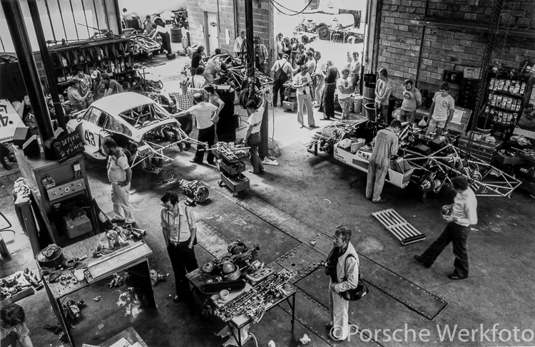 Porsche’s quartet of factory cars is prepared in the workshop at Teloché. The #43 Martini Porsche 935/78 ‘Moby Dick’ can be seen on the left of the photo, while the 936s occupy positions along the far wall