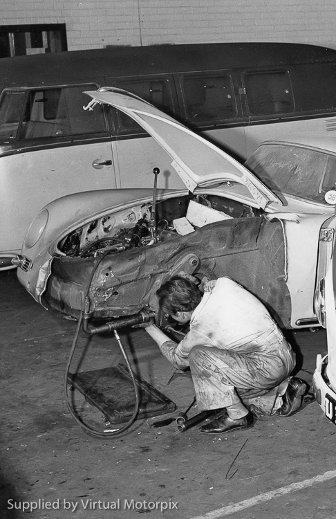 An early Porsche 356 undergoing repairs