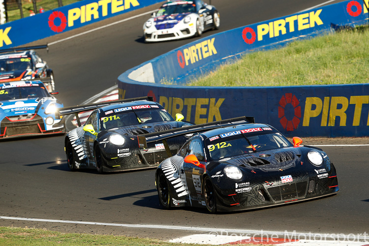 The #912 EBM Porsche 911 GT3 R driven by Dirk Werner, Dennis Olsen and Matt Campbell, is pursued by the #911 Porsche 911 GT3 R sister car of Romain Dumas, Sven Müller and Mathieu Jaminet