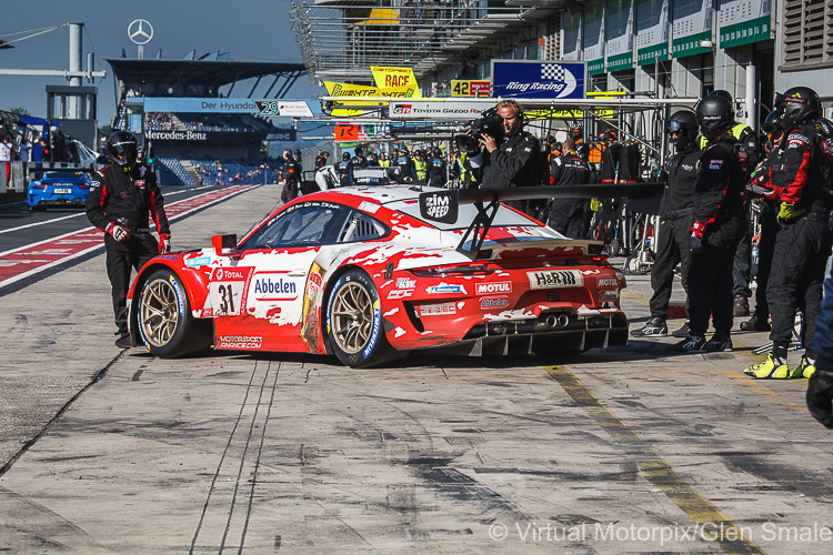 The #31 Frikadelli Racing Porsche 911 GT3 R driven by Romain Dumas, Matt Campbell, Sven Müller and Mathieu Jaminet waits in the pit lane before being released