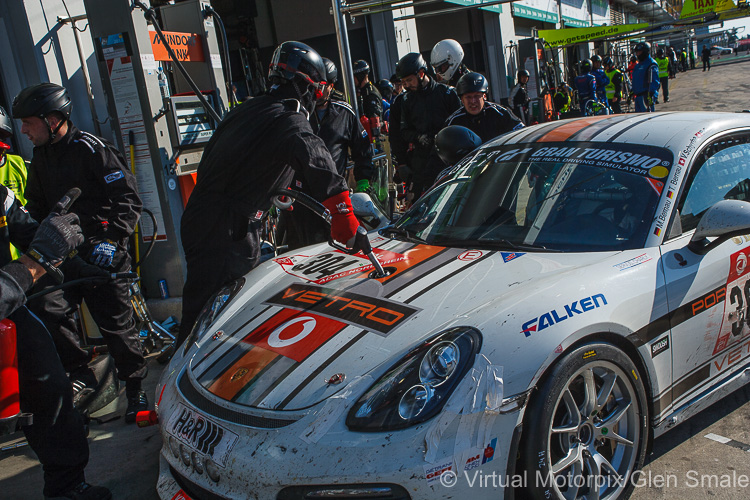 he #304 MKR-Engineering Porsche Cayman GT4 CS driven by Maximilian and Thomas Bernau, Viktor Schurba and Benedikt Frei pits for fuel and tyres