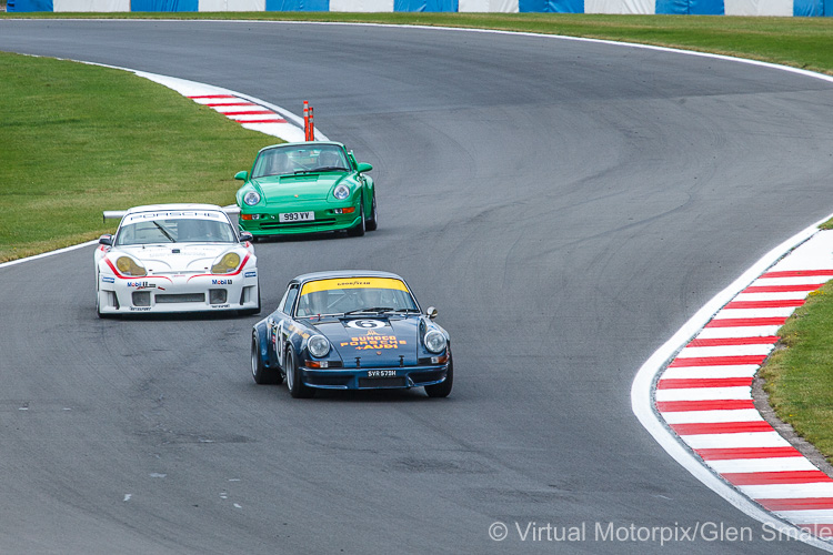 The #6 Sunoco Carrera RSR heads a group of 911s including the #53 Porsche 996 GT3 RS and a roadgoing 993 RS