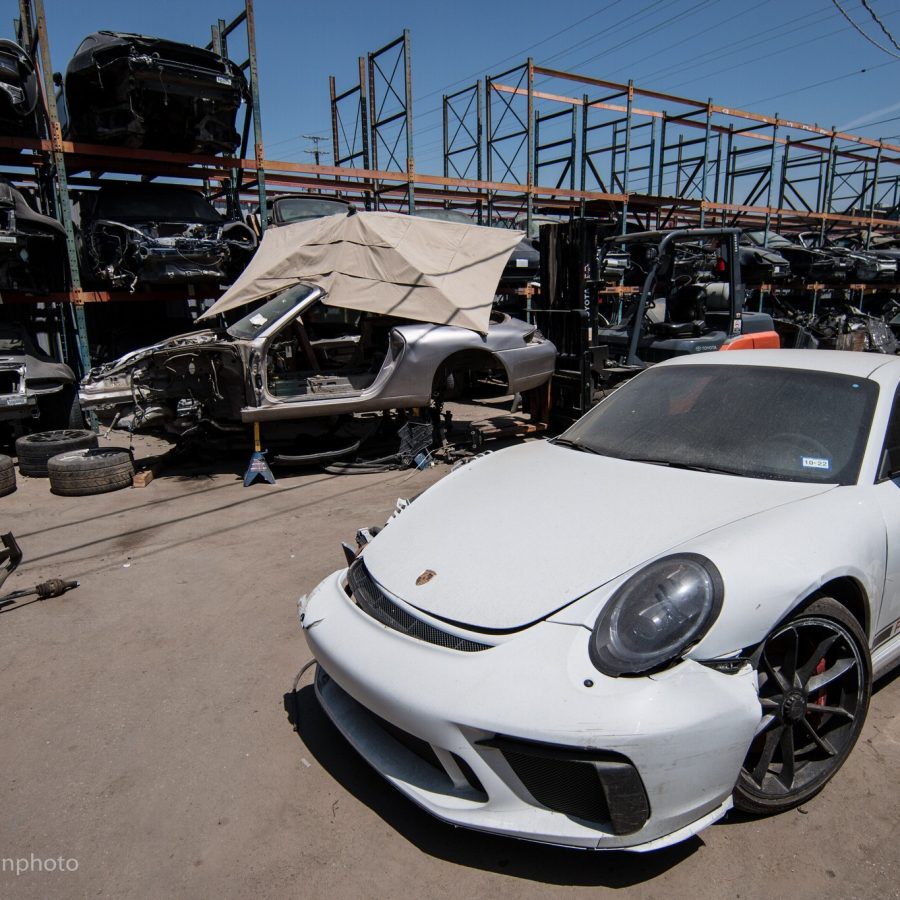 A white Porsche at the Los Angeles Dismantler yard in Sun Valley California.