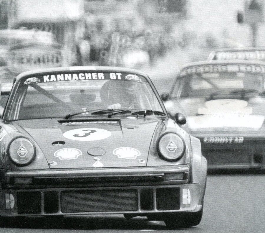 Porsche 934 ahead of other cars during race