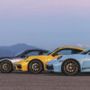 Various colors of Porsche 911 models.
