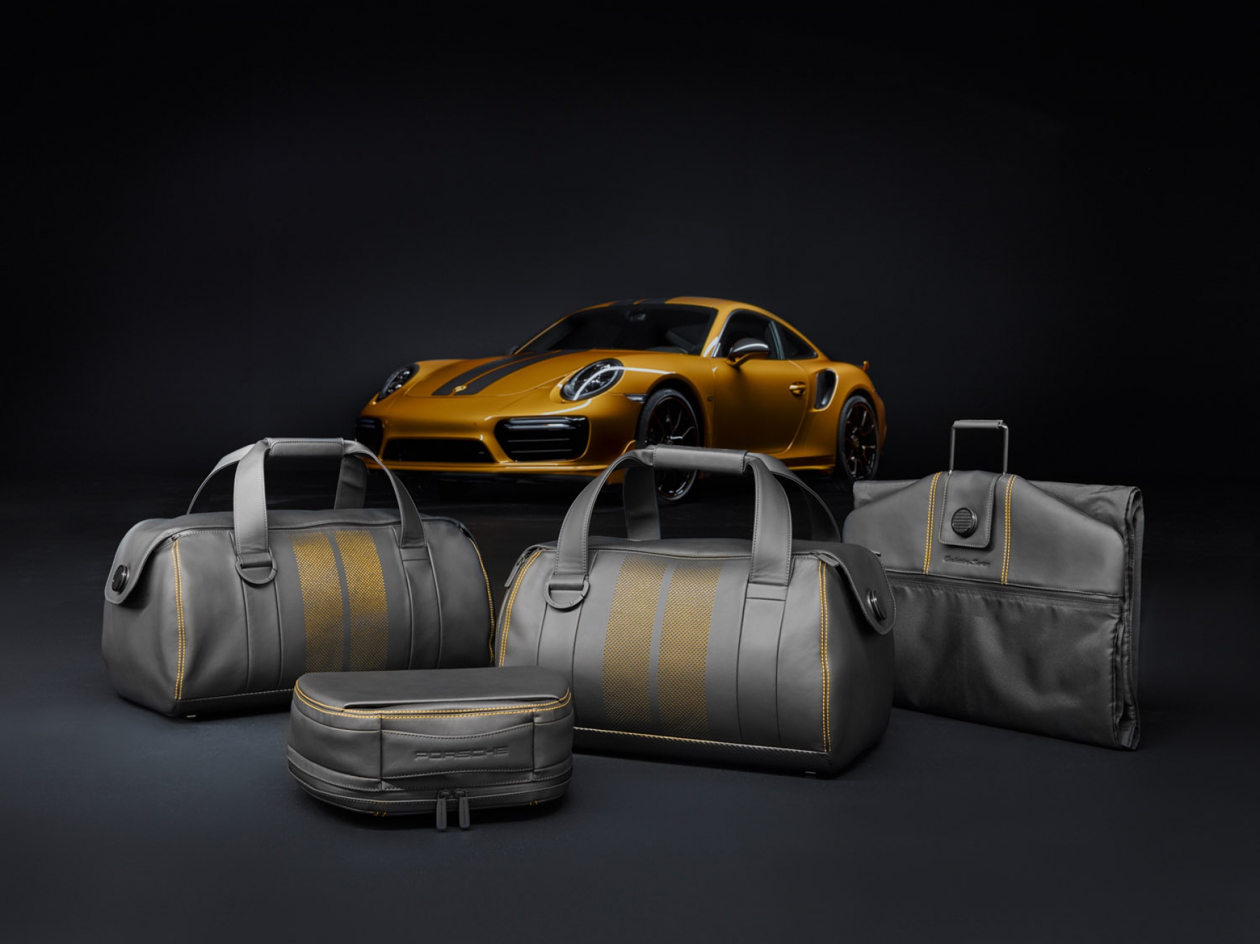 Image of Porsche 911 Turbo S Exclusive Series with matching luggage.