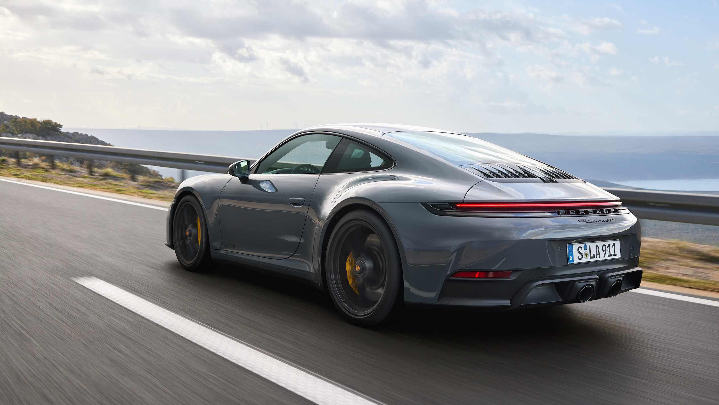 Three-quarter rear view of a 2024 911 Carrera GTS,