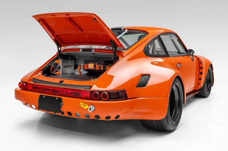 Three-quarter rear view of the E Porsche 911 restomod by Ruffian Cars