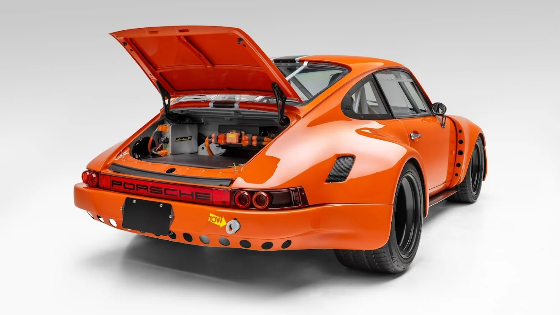 Three-quarter rear view of the E Porsche 911 restomod by Ruffian Cars