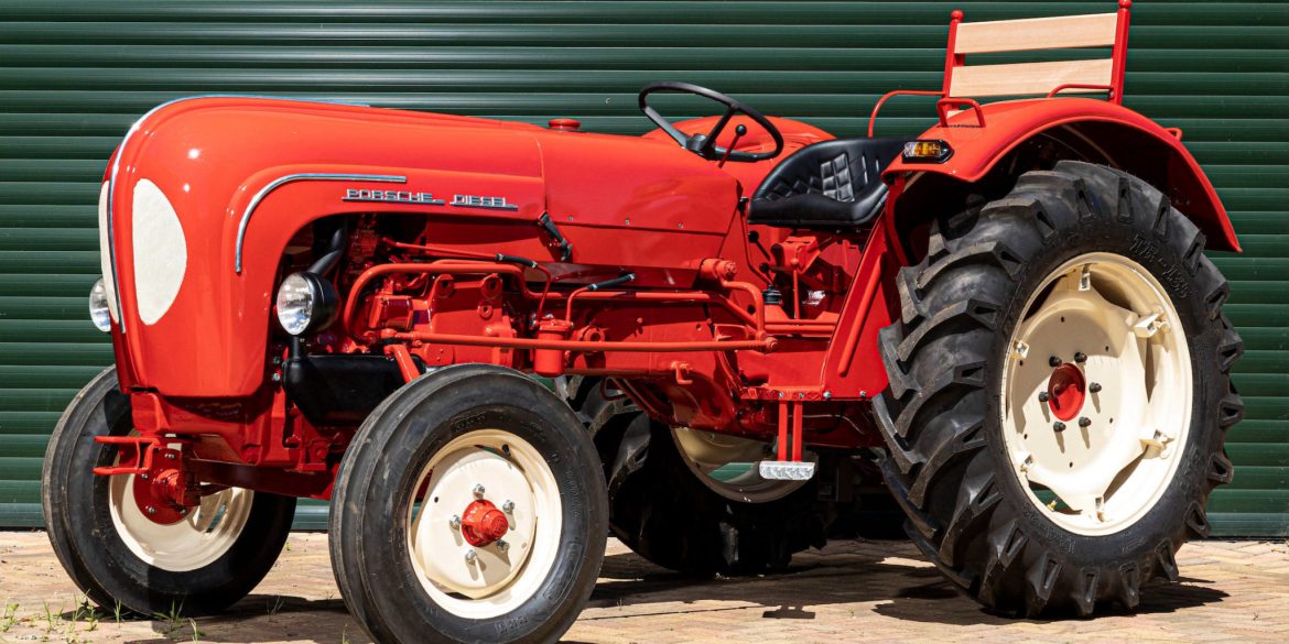 Three-quarter view of a red Porsche Tractor Model 219